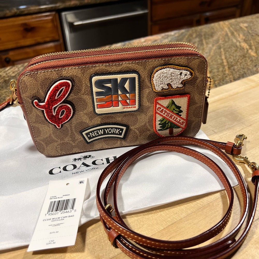 Coach crossbody with Embroidered Patches. New with tag(removed)